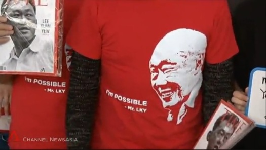 11th April . Singapore Day 2015 . Shanghai, China. A man printed T-shirts  to pay tribute to Mr Lee Kuan Yew. He gave it out for free. – Interior  Design Confederation (Singapore)